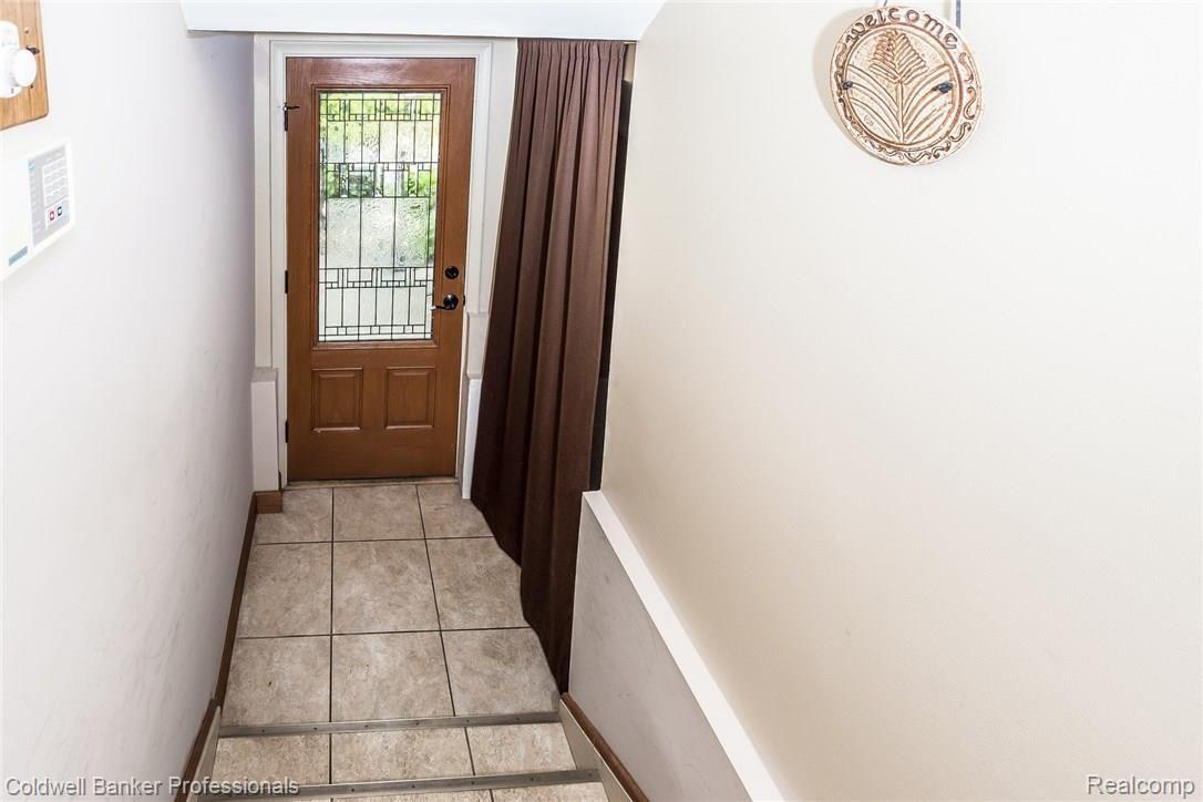 21591 Garfield Road Northville, MI 48167 - Photo 60 of 90 STAIRS LEADING TO THE SIDE DOOR
