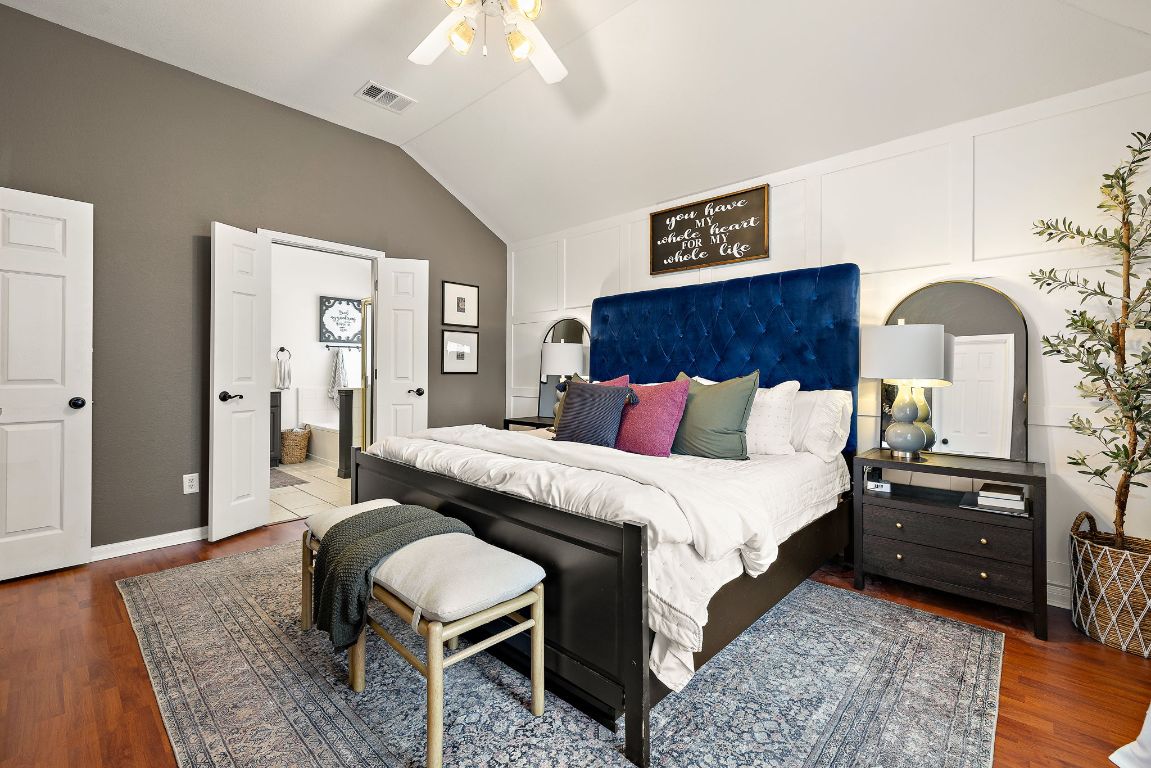 131 Chandler Pointe Loop Round Rock, TX 78665 - Photo 18 of 31 a bedroom with bed and a dresser