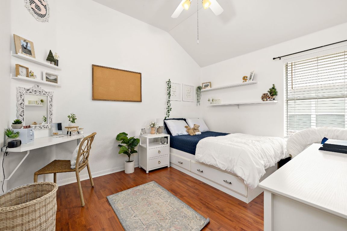 131 Chandler Pointe Loop Round Rock, TX 78665 - Photo 23 of 31 a bedroom with furniture and a large window