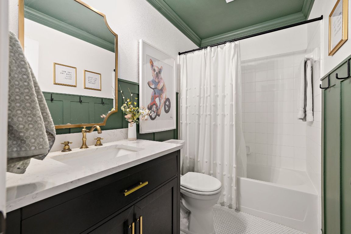 131 Chandler Pointe Loop Round Rock, TX 78665 - Photo 24 of 31 a bathroom with a sink a toilet and shower