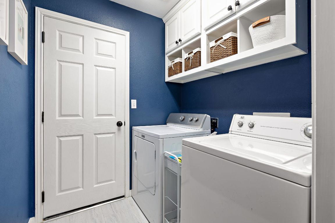 131 Chandler Pointe Loop Round Rock, TX 78665 - Photo 25 of 31 a utility room with dryer and washer