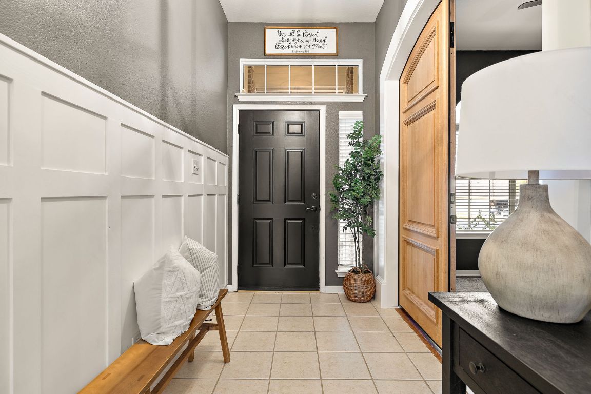 131 Chandler Pointe Loop Round Rock, TX 78665 - Photo 5 of 31 a bathroom with a tub and shower
