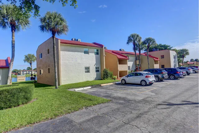 a view of a car is parked in front of a house