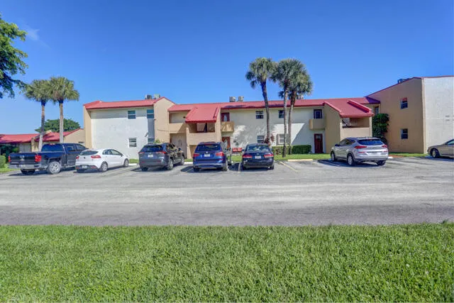 a view of car parked in front of house