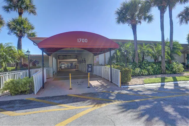 a view of a backyard with a patio
