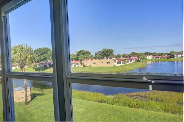 a view of swimming pool from a balcony