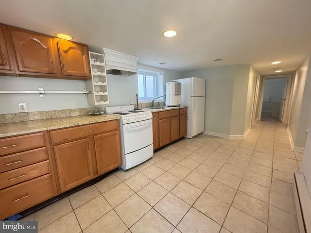 a kitchen with a cabinets and sink