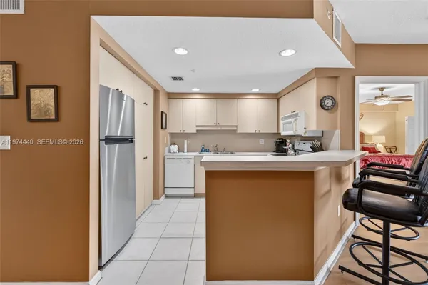 $249,750 | 4401 Crystal Lake Drive, Unit 101, Deerfield Beach, FL 33064