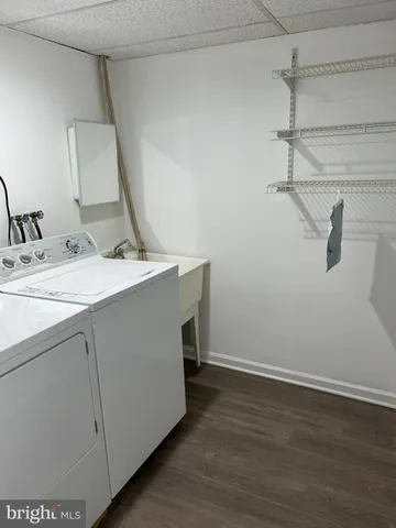 a storage room with wooden floor