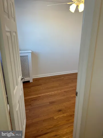 a view of small space with wooden floor