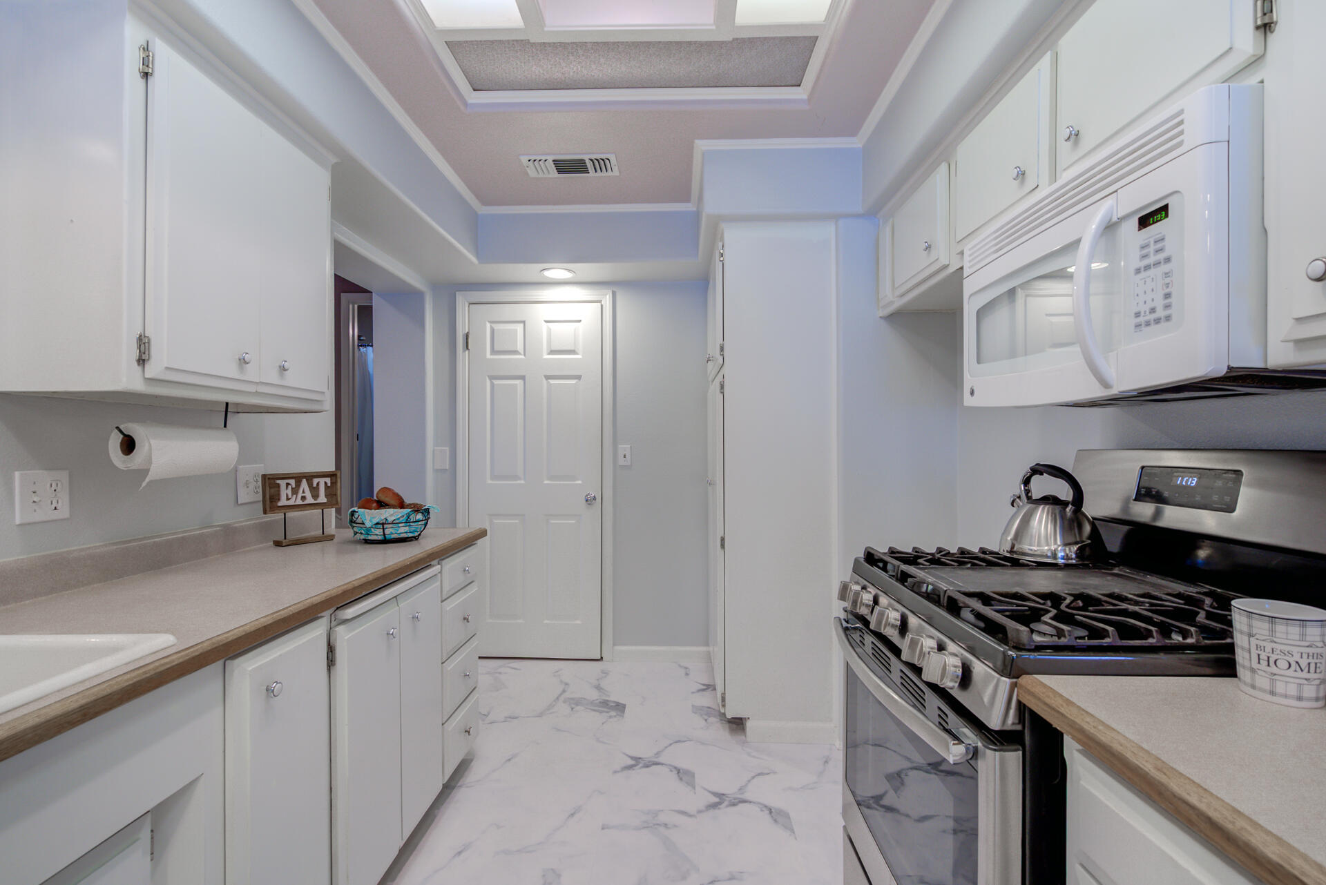 1208 Riviera Drive Redding, CA 96001 - Photo 12 of 39 a kitchen that has a sink and a stove