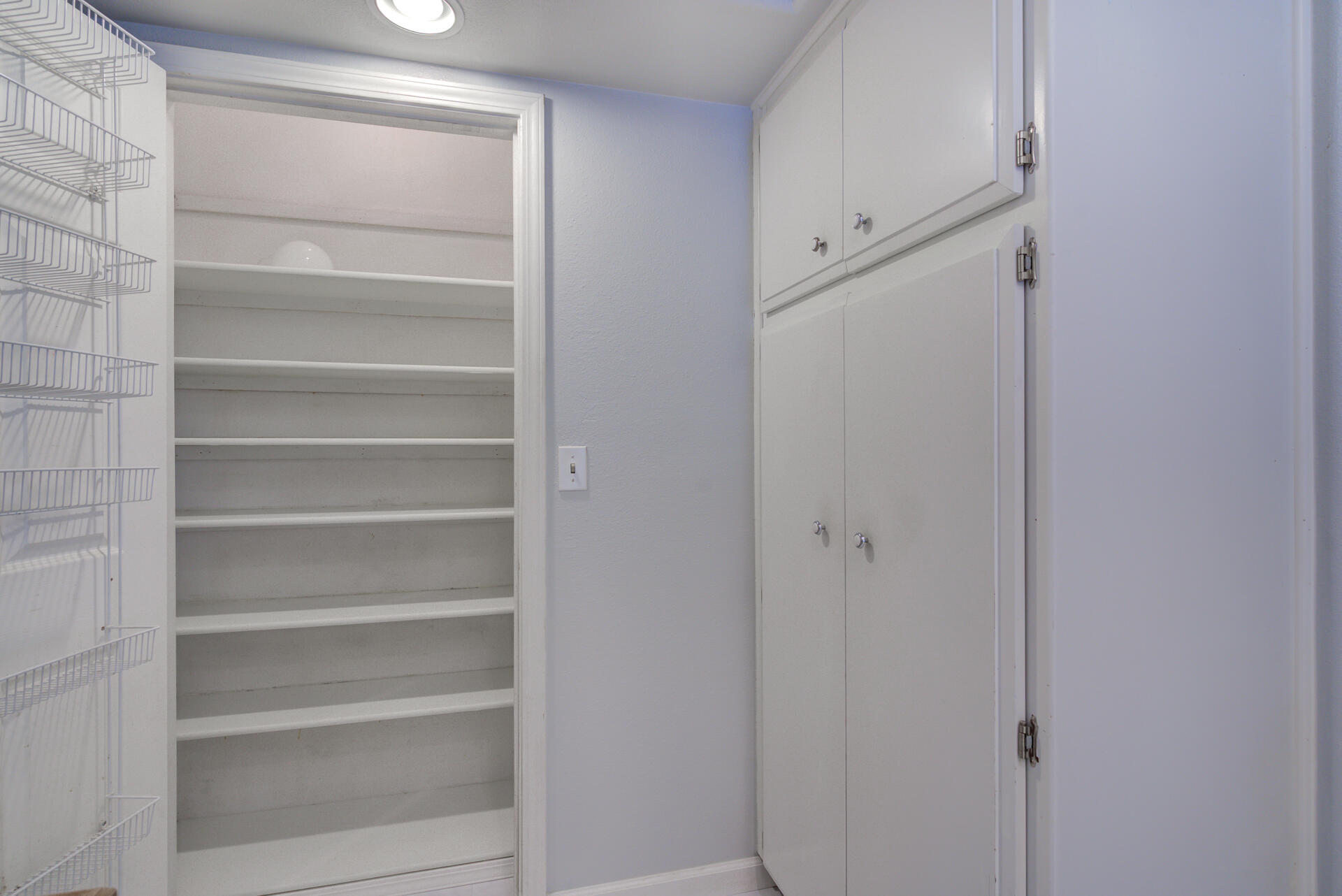 1208 Riviera Drive Redding, CA 96001 - Photo 14 of 39 a view of walk in closet with empty racks
