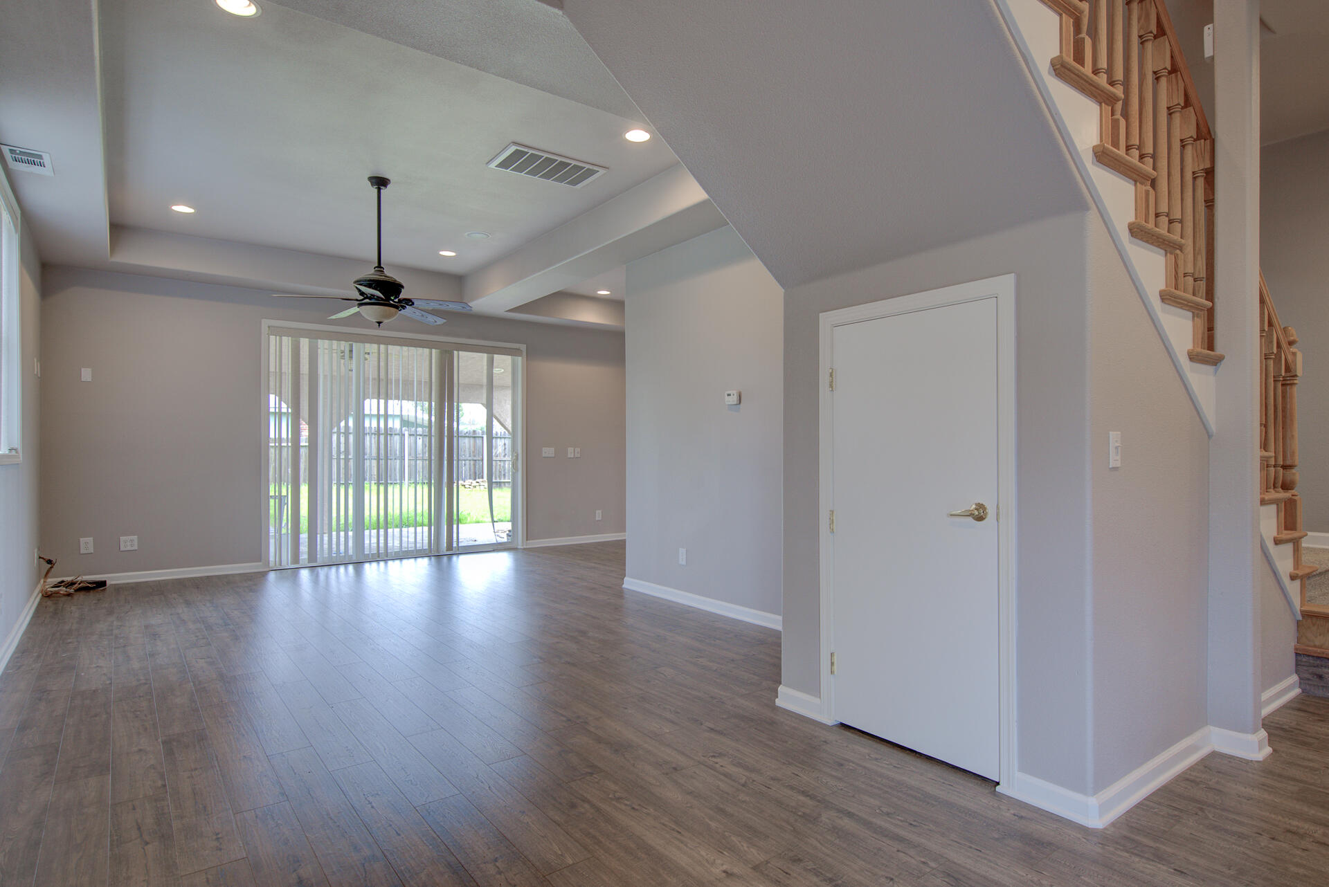 1208 Riviera Drive Redding, CA 96001 - Photo 21 of 39 a view of an empty room with wooden floor and a window