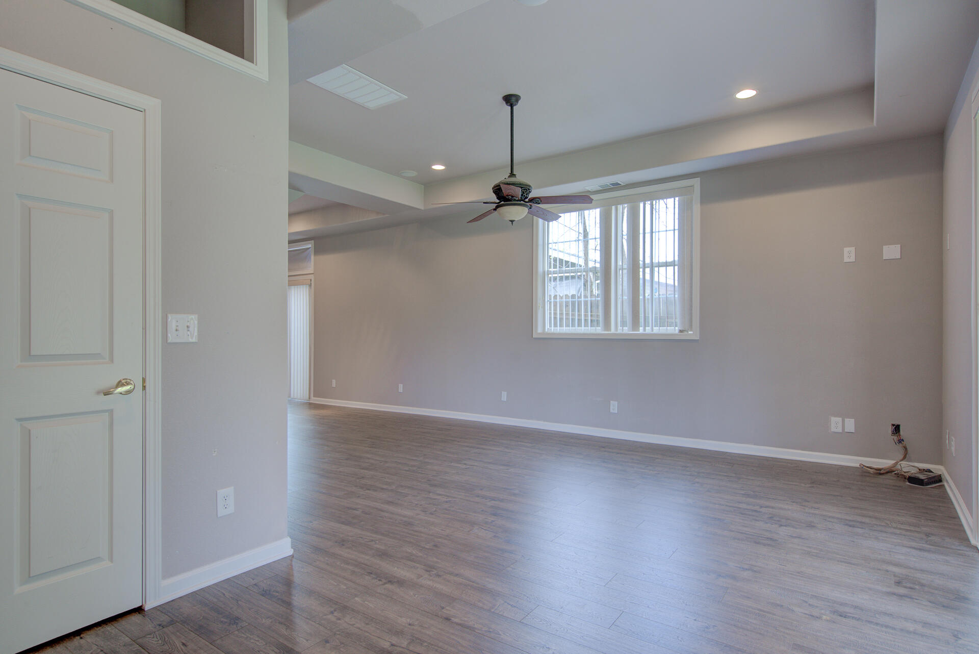 1208 Riviera Drive Redding, CA 96001 - Photo 22 of 39 wooden floor in an empty room with a window