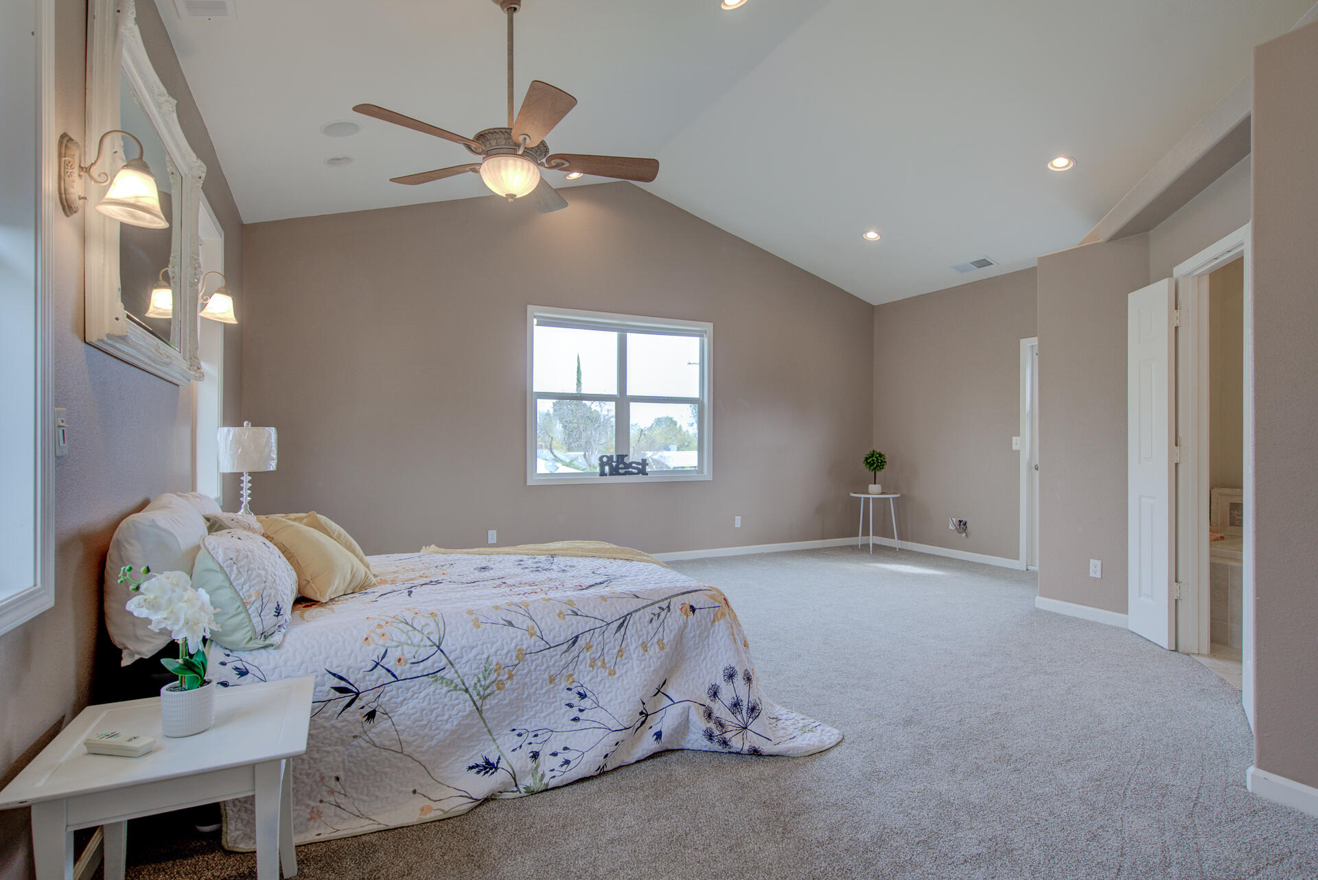 1208 Riviera Drive Redding, CA 96001 - Photo 27 of 39 a bedroom with a bed and a window