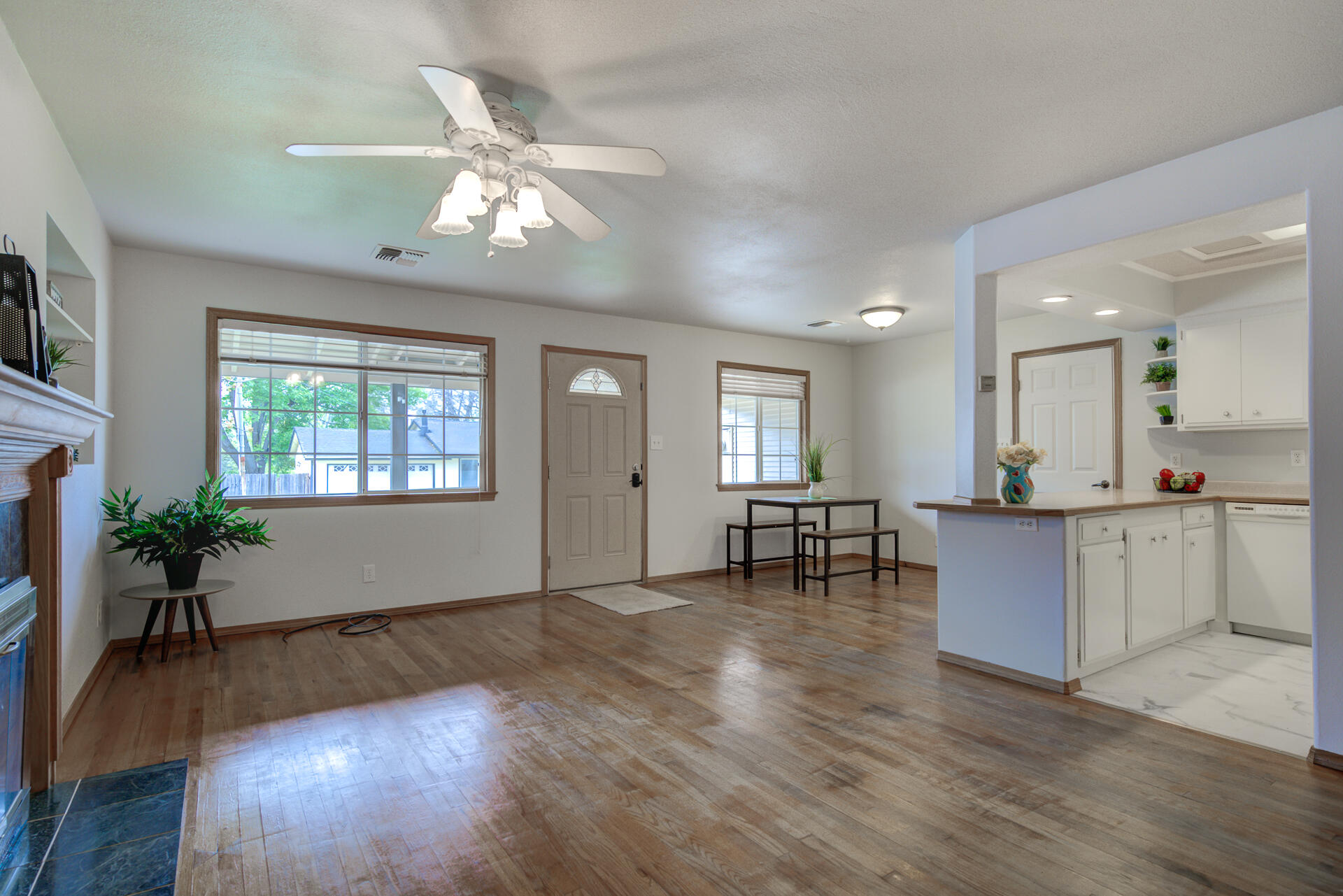 1208 Riviera Drive Redding, CA 96001 - Photo 5 of 39 a living room with furniture and a wooden floor