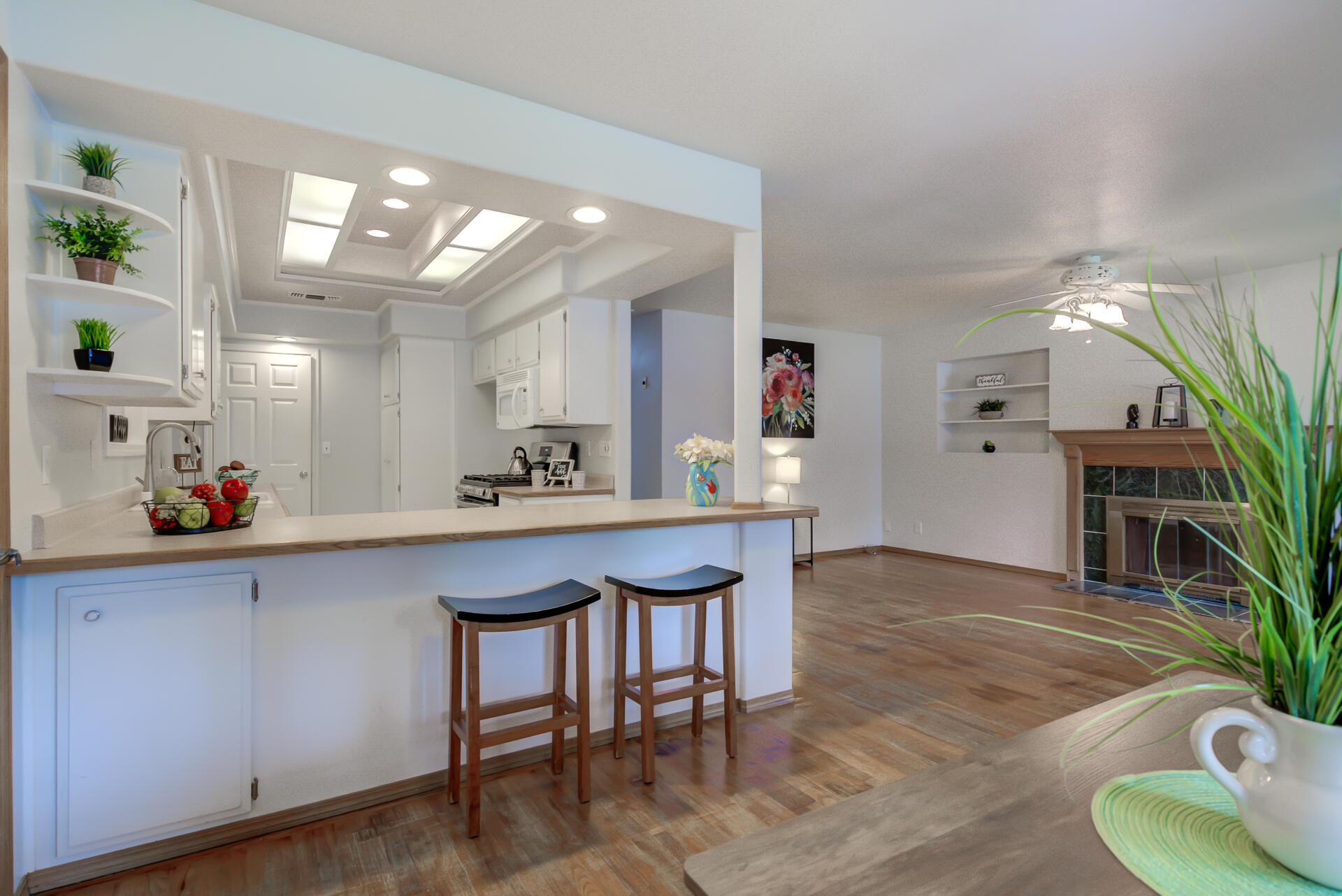 1208 Riviera Drive Redding, CA 96001 - Photo 8 of 39 a kitchen with cabinets and wooden floor