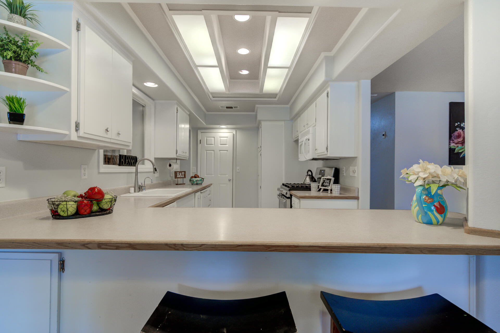 1208 Riviera Drive Redding, CA 96001 - Photo 9 of 39 a kitchen with a sink and cabinets