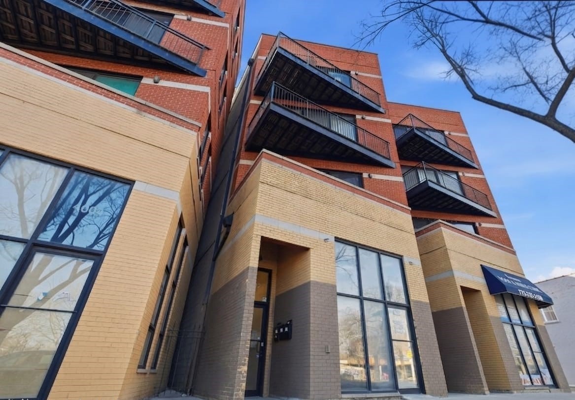 4002 South Western Avenue, Unit 4 Chicago, IL 60609 - Photo 1 of 31 a view of a building with a door