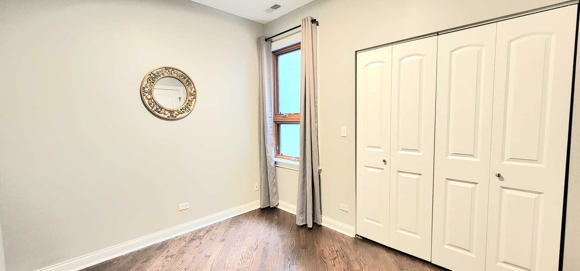 4002 South Western Avenue, Unit 4 Chicago, IL 60609 - Photo 13 of 31 a view of a room with wooden floor