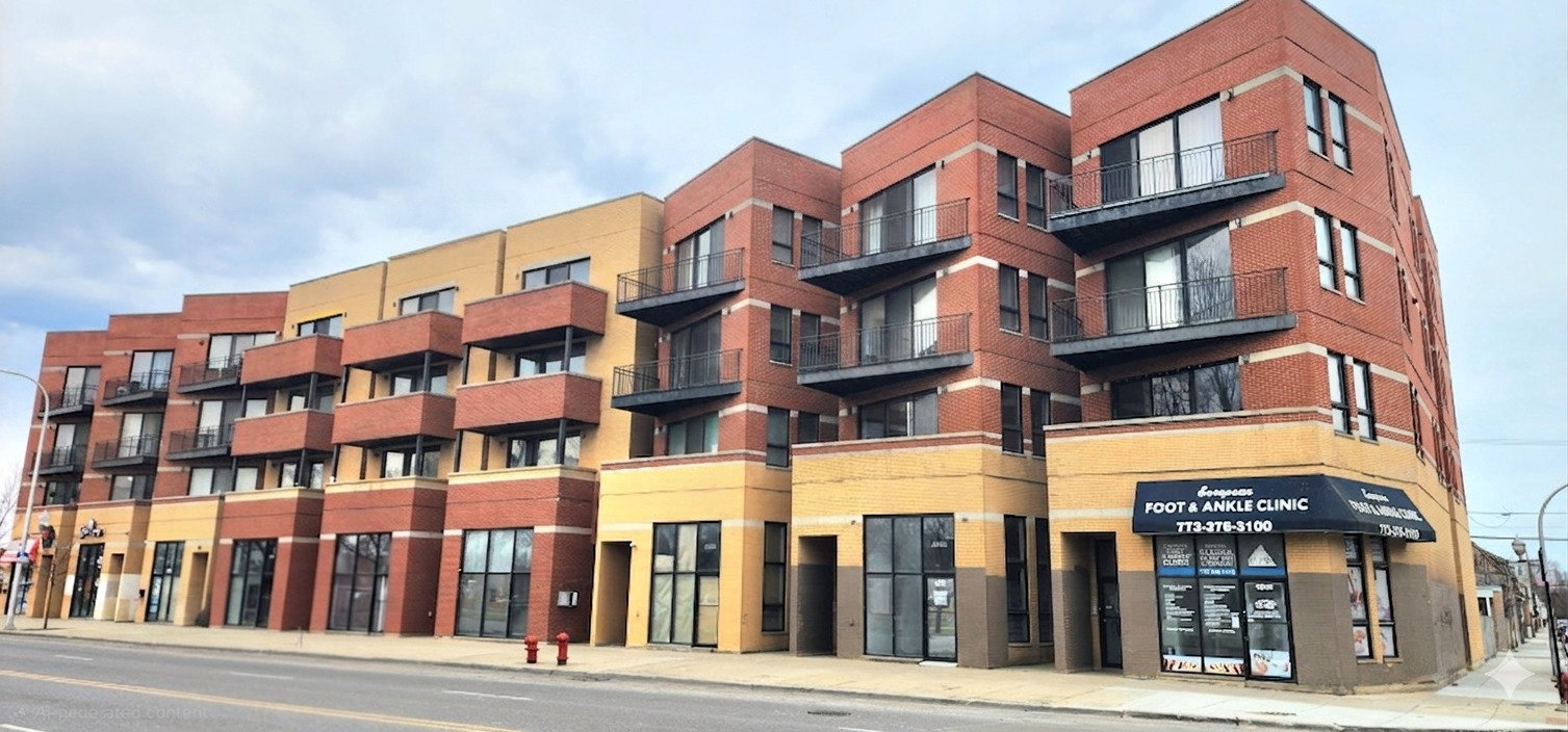 4002 South Western Avenue, Unit 4 Chicago, IL 60609 - Photo 2 of 31 a front view of a building with a street