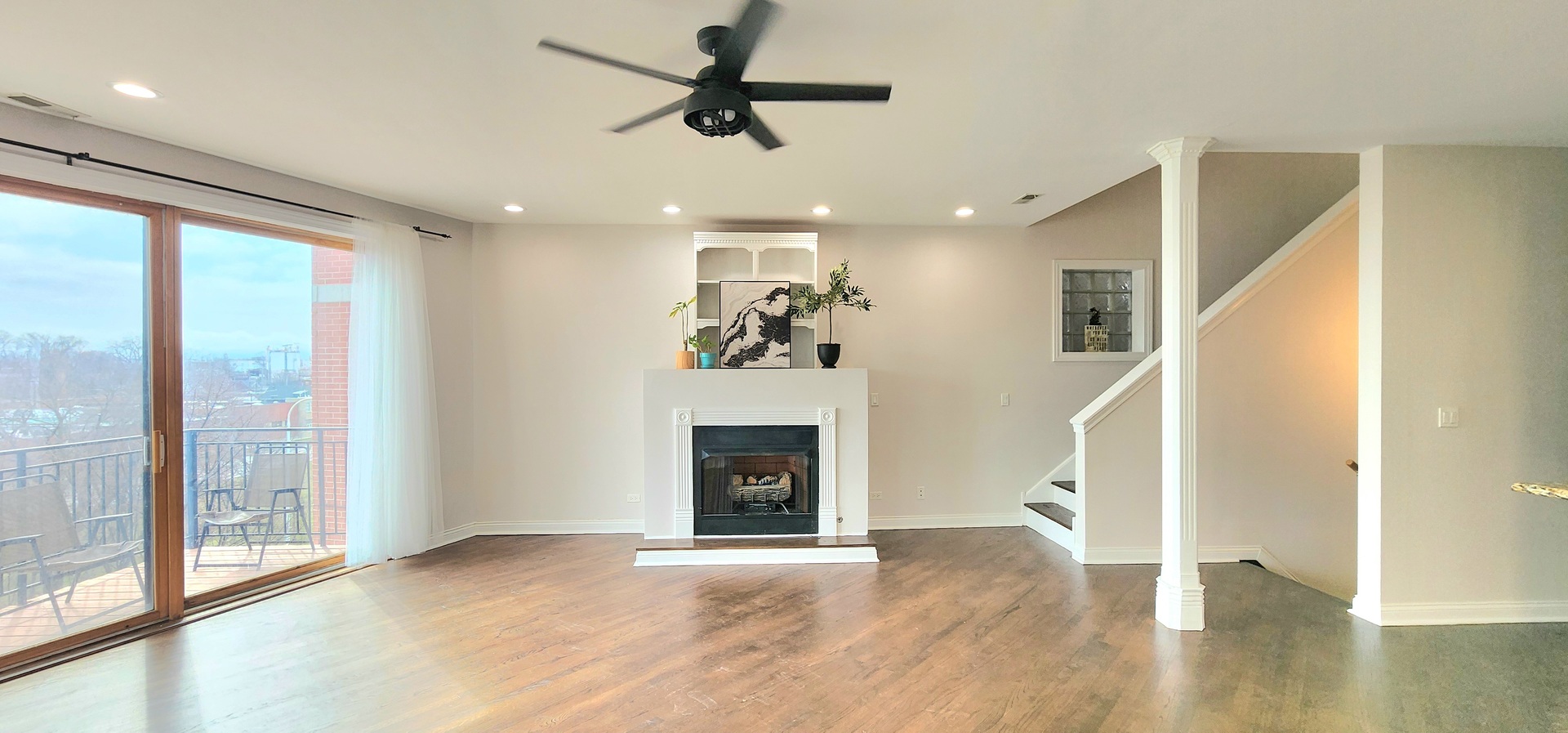 4002 South Western Avenue, Unit 4 Chicago, IL 60609 - Photo 6 of 31 a view of a livingroom with a fireplace and window