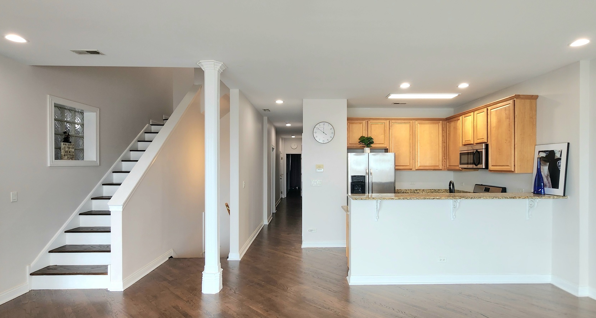 4002 South Western Avenue, Unit 4 Chicago, IL 60609 - Photo 7 of 31 a kitchen with stainless steel appliances granite countertop a refrigerator and a sink
