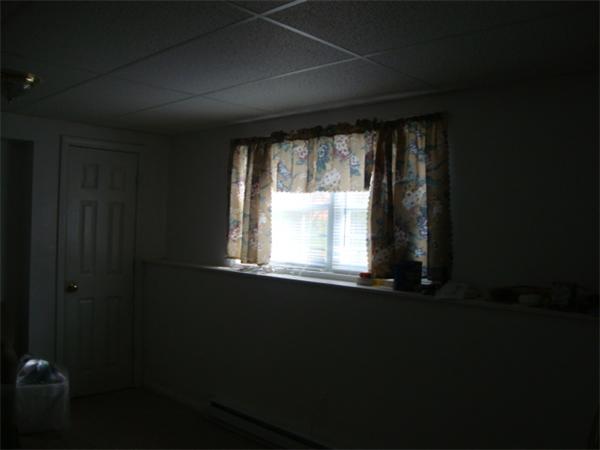 1083 Old Coldbrook Road Barre, MA 01005 - Photo 14 of 14 a view of an empty room with a window