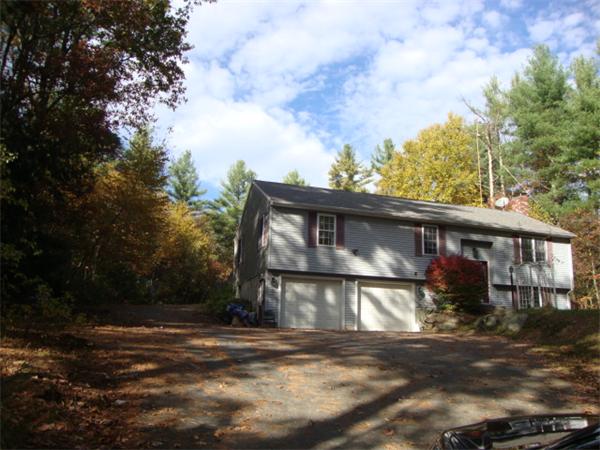 1083 Old Coldbrook Road Barre, MA 01005 - Photo 3 of 14 a view of a house with a yard