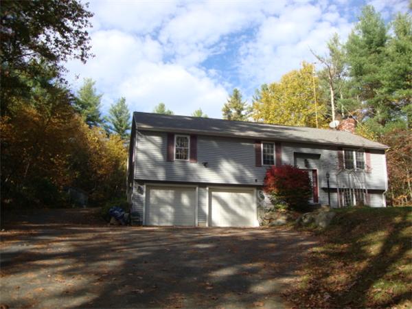 1083 Old Coldbrook Road Barre, MA 01005 - Photo 4 of 14 a view of a house with a yard