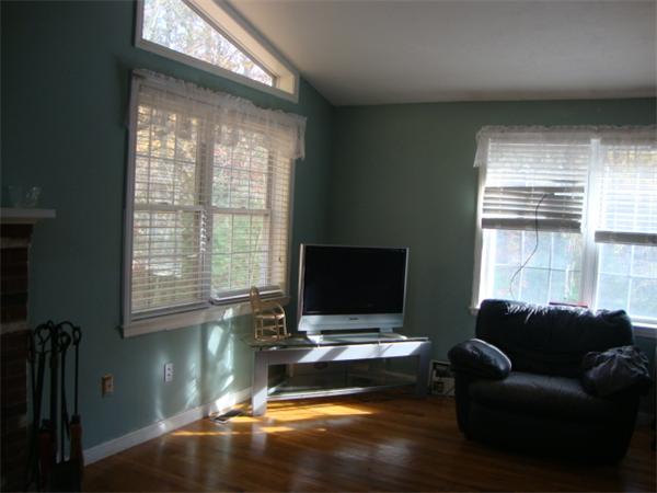 1083 Old Coldbrook Road Barre, MA 01005 - Photo 8 of 14 a living room with furniture and a flat screen tv