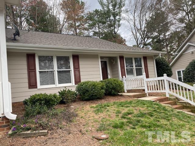 6422 Meadow View Drive Raleigh, NC 27609 - Photo 1 of 5 a front view of a house with a yard