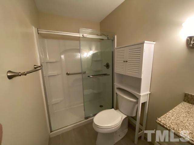 6422 Meadow View Drive Raleigh, NC 27609 - Photo 5 of 5 a bathroom with a toilet and a shower