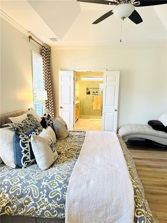 8002 Ashwell Court Woodstock, GA 30189 - Photo 11 of 14 a bedroom with a bed and a couch