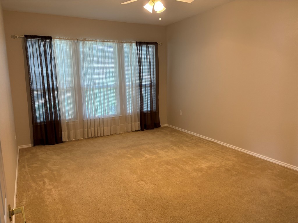 106 Bowie Circle Georgetown, TX 78633 - Photo 15 of 33 an empty room with windows