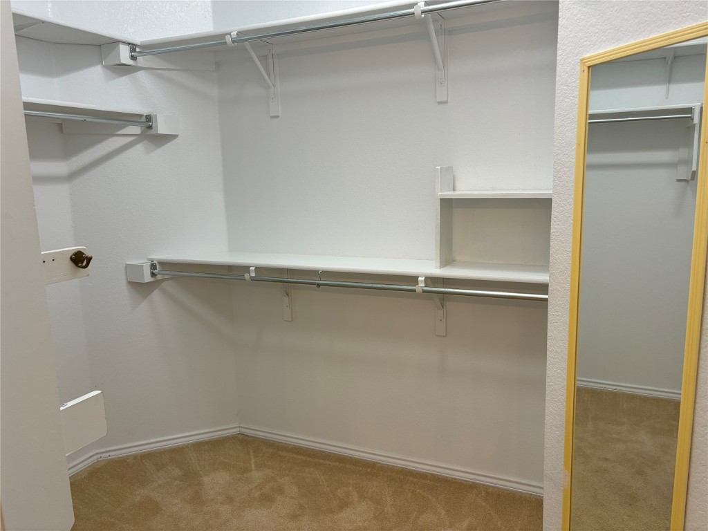 106 Bowie Circle Georgetown, TX 78633 - Photo 19 of 33 a view of a room with shelf on the wall