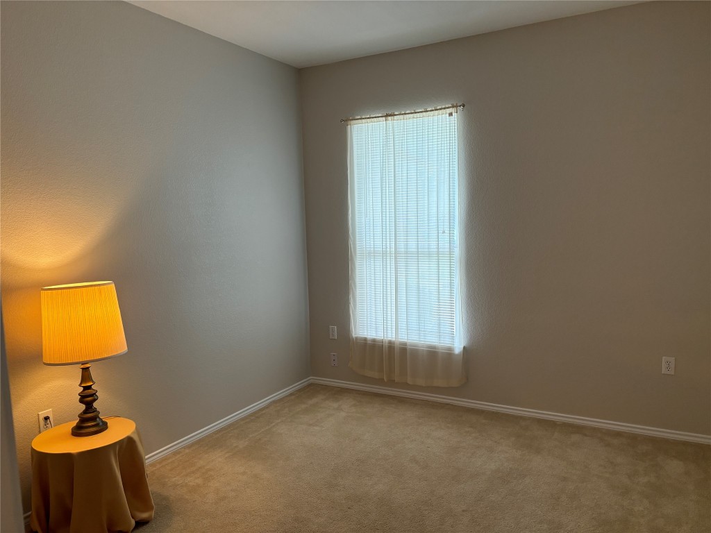 106 Bowie Circle Georgetown, TX 78633 - Photo 22 of 33 a bathroom with a window