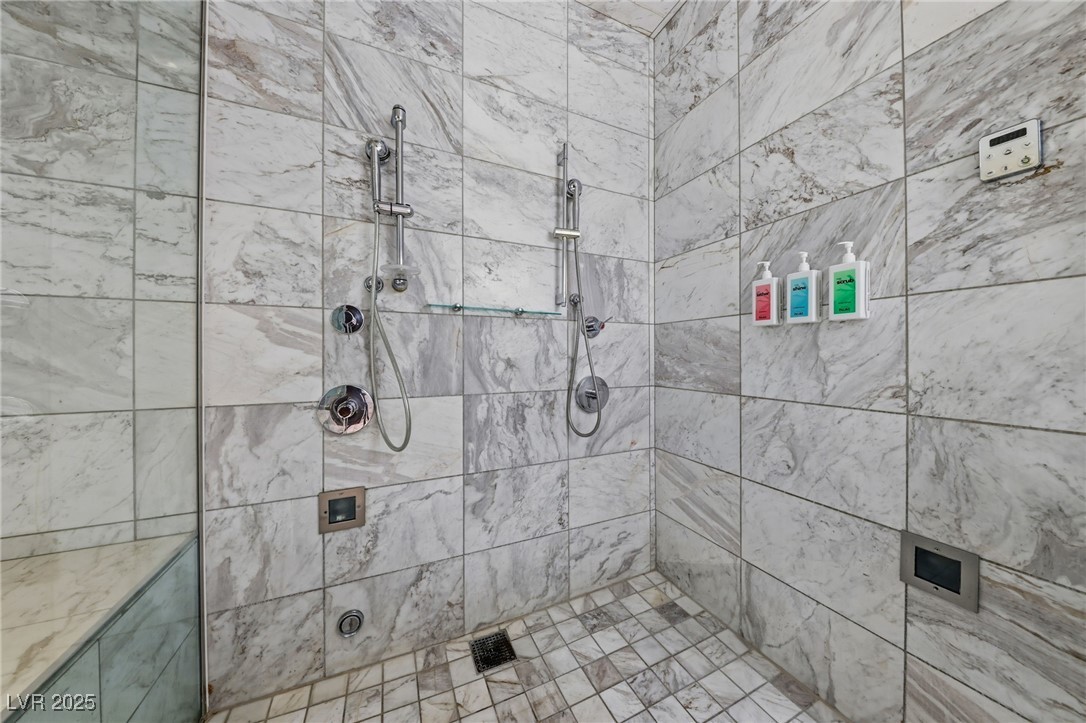 4381 West Flamingo Road, Unit 58301 Las Vegas, NV 89103 - Photo 22 of 32 Full bath with a tile shower