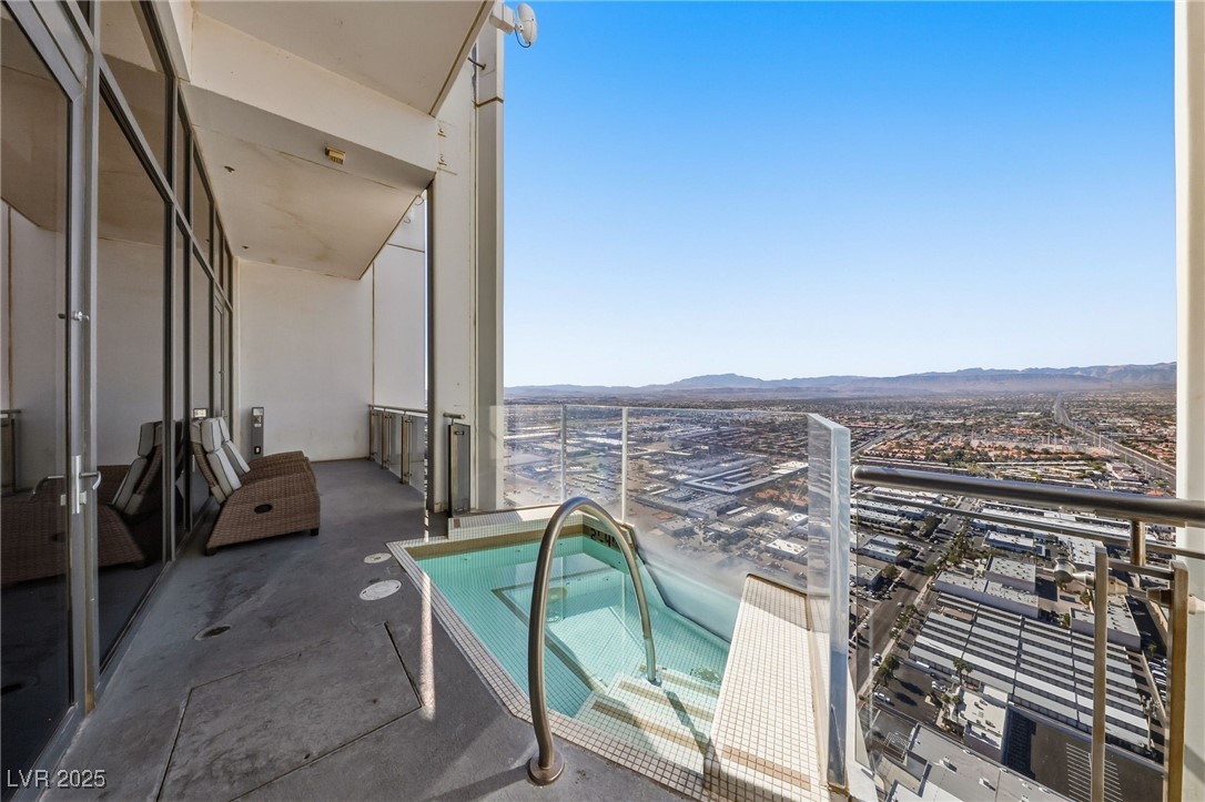 4381 West Flamingo Road, Unit 58301 Las Vegas, NV 89103 - Photo 3 of 32 Balcony with a mountain view