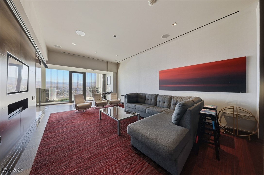 4381 West Flamingo Road, Unit 58301 Las Vegas, NV 89103 - Photo 10 of 32 Living room with recessed lighting and wood finished floors