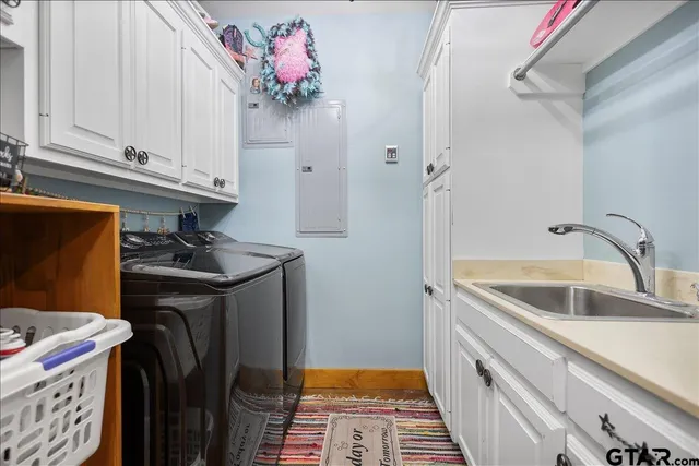 a bathroom with a sink a vanity and a mirror