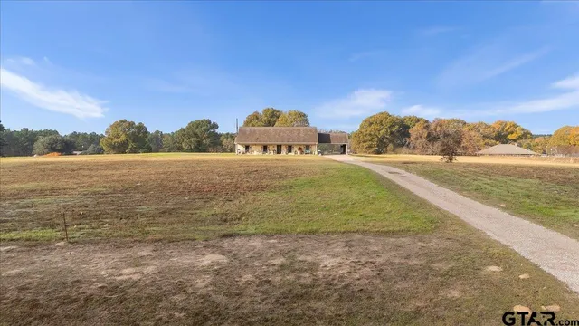 a view of an ocean with a mountain