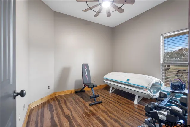 a bedroom with furniture and a window