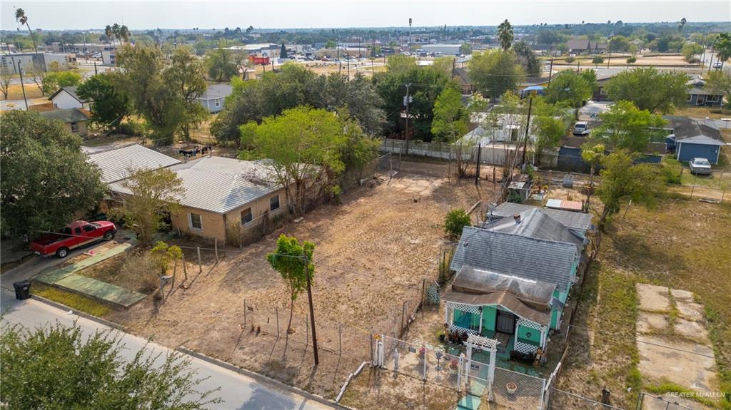 222 West Pablo Layton Street Elsa, TX 78543 - Photo 2 of 9 an aerial view of a house with a lake view