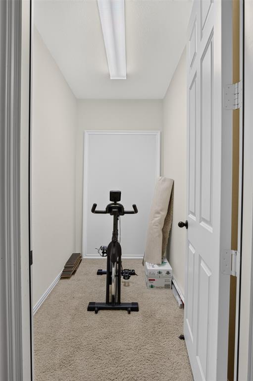 842 Sun Meadow Road Allen, TX 75013 - Photo 30 of 39 Recessed alcove featuring neutral carpeting and light-toned walls