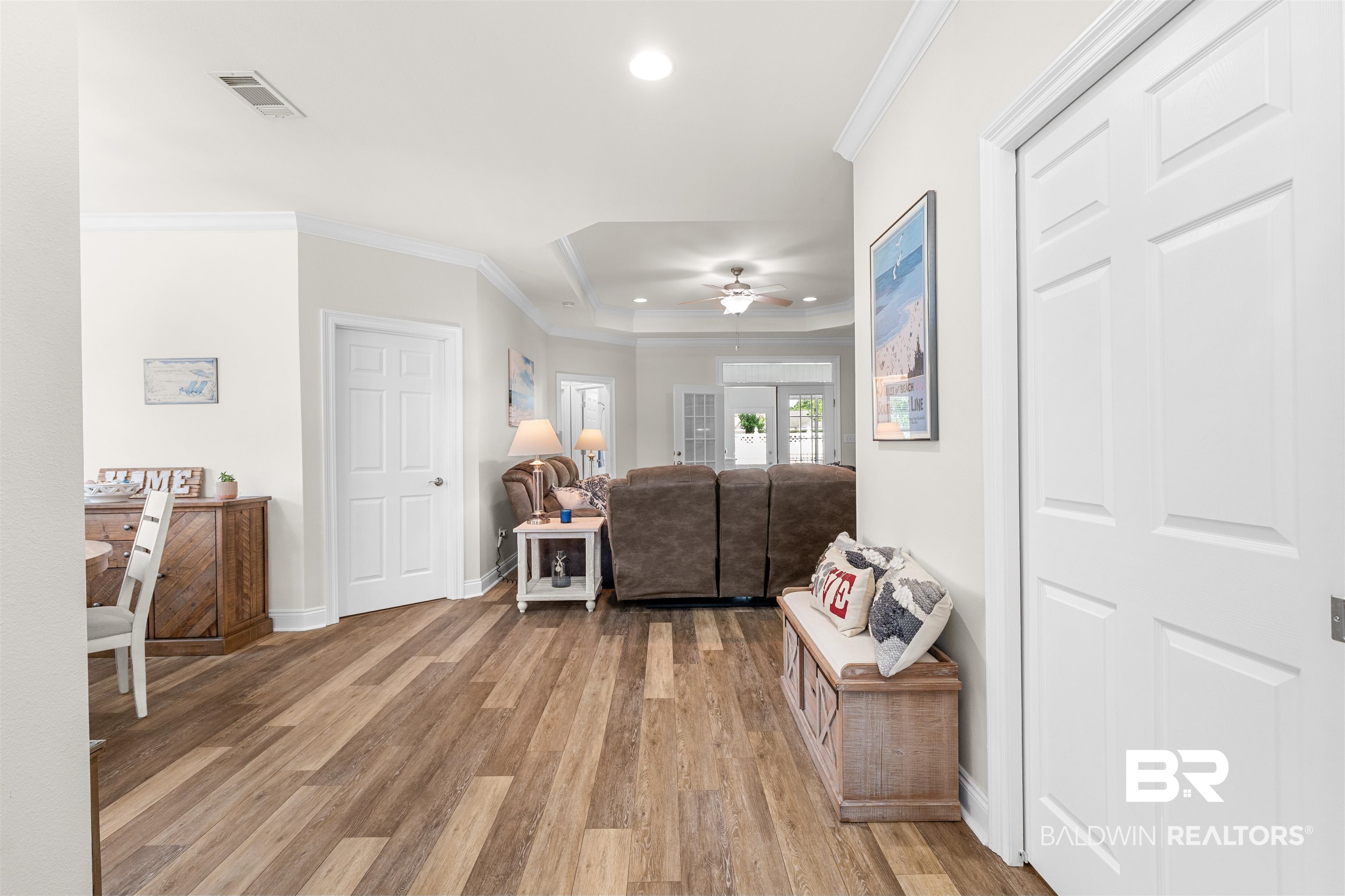141 Mark Twain Loop Foley, AL 36535 - Photo 4 of 55 Living area featuring recessed lighting, ornamental molding, a raised ceiling, light wood-style flooring, and ceiling fan
