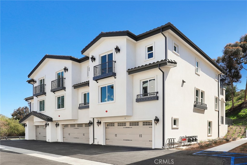 15 Turnberry Lane Phillips Ranch, CA 91766 - Photo 29 of 63 a view of white house with white walls