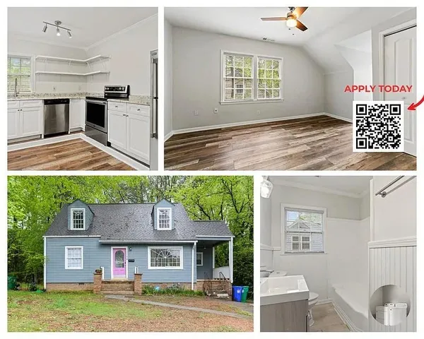 a view of an house with backyard space and balcony