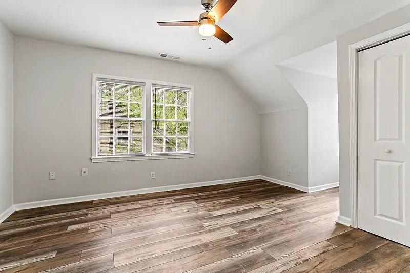 1268 Eastland Road Southeast, Unit B Atlanta, GA 30316 - Photo 13 of 20 a view of empty room with wooden floor and fan