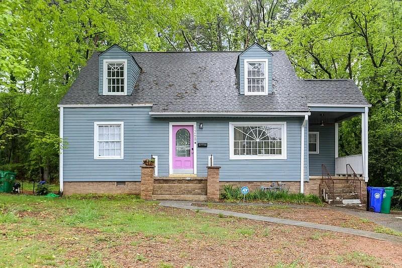1268 Eastland Road Southeast, Unit B Atlanta, GA 30316 - Photo 3 of 20 a front view of a house with garden